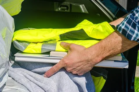 Taking stuff from car trunk Stock Photos