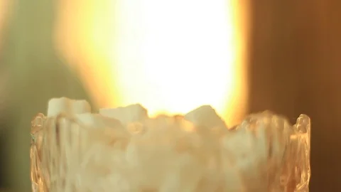 Taking sugar from a tea bowl 動画素材 70513737