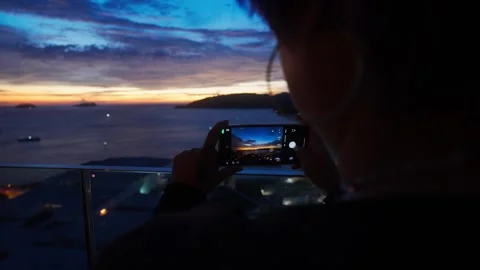 Taking a sunset photo Stock Footage 300734273