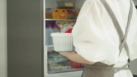 Taking Takeout Food Container Out of Refrigerator Close Up Stock Footage 335797626