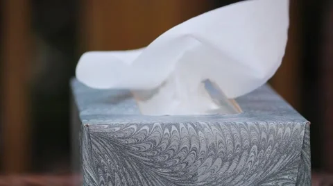 Taking a Tissue from Box Stock Footage 59826329