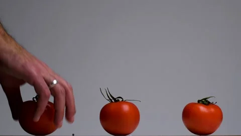 Taking tomatoes Stock Footage 132861952