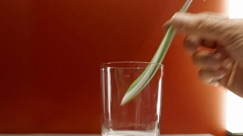 Taking a toothbrush from a glass Stock Footage 111362971