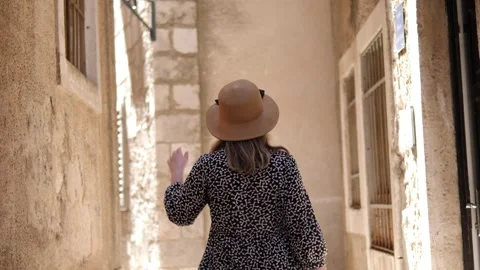 Taking a trip down a charmingly picturesque lane in a charming town Stock Footage 303848080