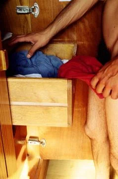 Taking underwear Stock Photos