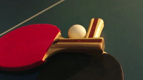 Taking video details closeup of a two paddles and ball over the table tennis Stock Footage 211737970