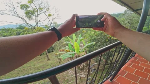 Taking a Video of Lush Tropical Hillside. 動画素材 329528948