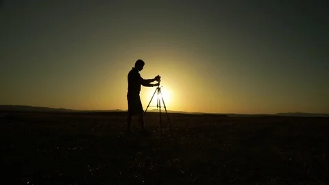 Taking video of the sunset Stock Footage 97995573