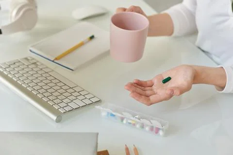 Taking vitamin to increase brain function Stock Photos