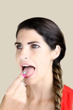 Taking a vitamin Stock Photos