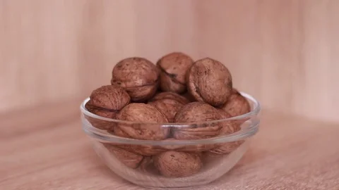 Taking walnuts from the glass can 動画素材 81584071