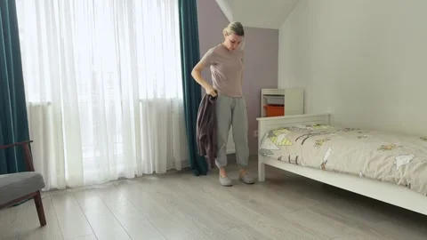 Taking Off Wool Sweater Home Routine Stock Footage 344248550