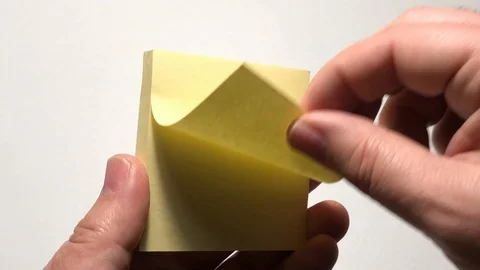 Taking yellow post-it Stock Footage 122097852