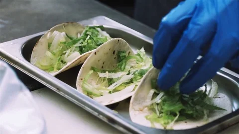 Takos cooking step by step for party in a restaurant by the chef Stock Footage 80186515
