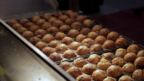 Takoyaki Balls being Cooked and Flipped by Chef in Asian Street Stock Footage