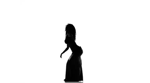 Talanted long-haired exotic belly dancer girl continue dance on white Video stock 60919819