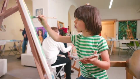Talent identification and development in children. Atmosphere of an art studio. Stock Footage