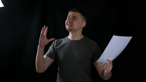 Talented actor practicing before performance at theater and memorizing lines Stock Footage 194534183
