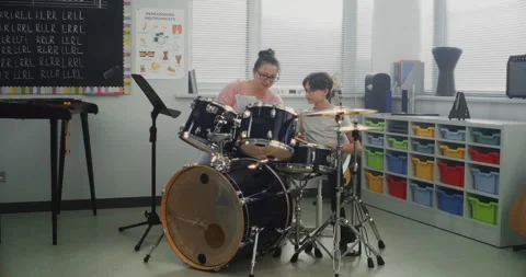 Talented Boy Playing Drums During Percussion Class. Teacher Teaching Young Video stock 317544325