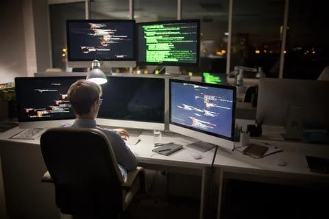 Talented Coder at Workplace Stock Photos