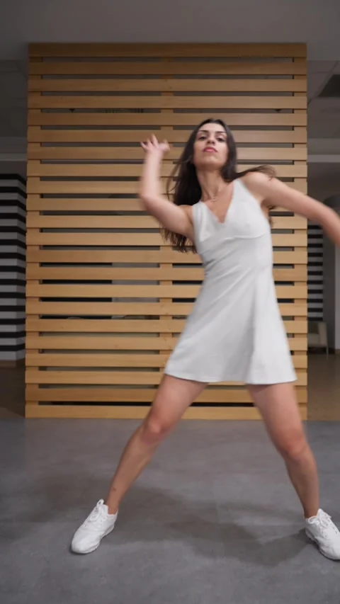 Talented dancer in motion performing a modern freestyle routine for social media 스톡 동영상 312515202
