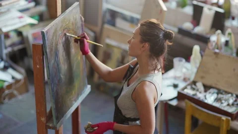 Talented painter creating artwork Stock Footage 142667441