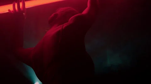 Talented professional dancer moves gracefully and emotionally in dark atmosphere Stock Footage 243090910