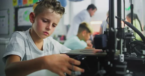 Talented Young Boy Using 3D Printer Touchscreen, Studying Advanced Automated 3D Stock Footage 314778763