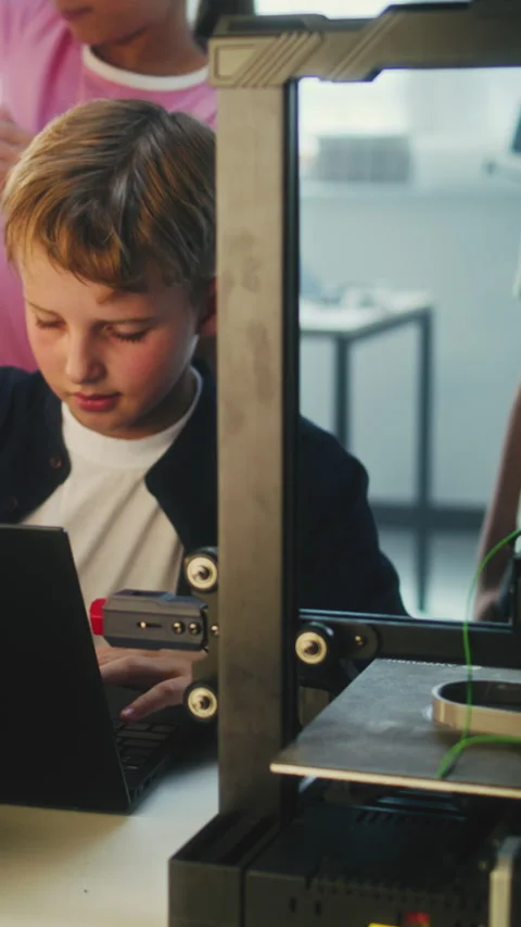 Talented Young Boy Writing Code for Automated 3D Printer on Laptop, Learning Stock Footage 311804599