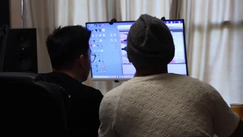 Talk in front of the computer Music production Stock Footage 246779471