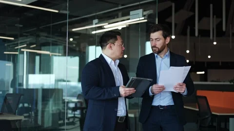 Talkative office workers using contemporary methods for working process indoors Stock-Footage 270922588