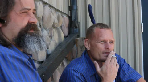 Talking and smoking Stock Footage 24773381