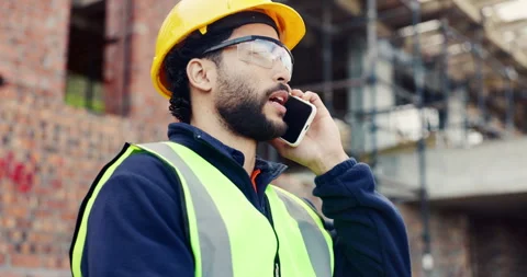 Talking, architect and man with phone call at construction site, track material Stock Footage 336779871
