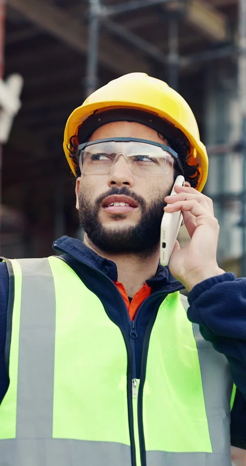 Talking, architect or man with phone call at construction site, schedule Stock Footage 336776045