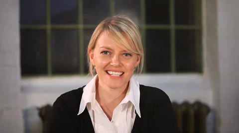 Talking to camera as if being interviewed or using computer or mobile camera to Stock Footage 32729458