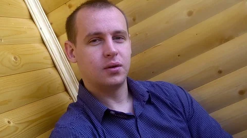 Talking to camera as if being interviewed or using computer or mobile camera to Video stock 75914543