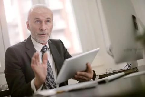 Talking with a client Stock Photos