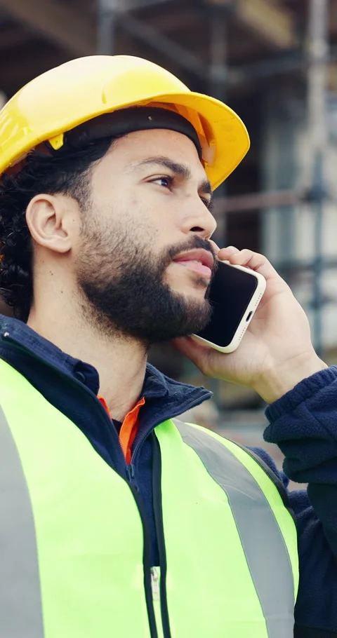 Talking, engineer or man with phone call at construction site, schedule feedback Stock Footage 336776862