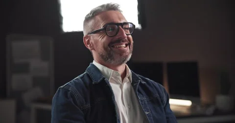 Talking, interview and man laughing in studio for filming with documentary, show Stock Footage 303461503