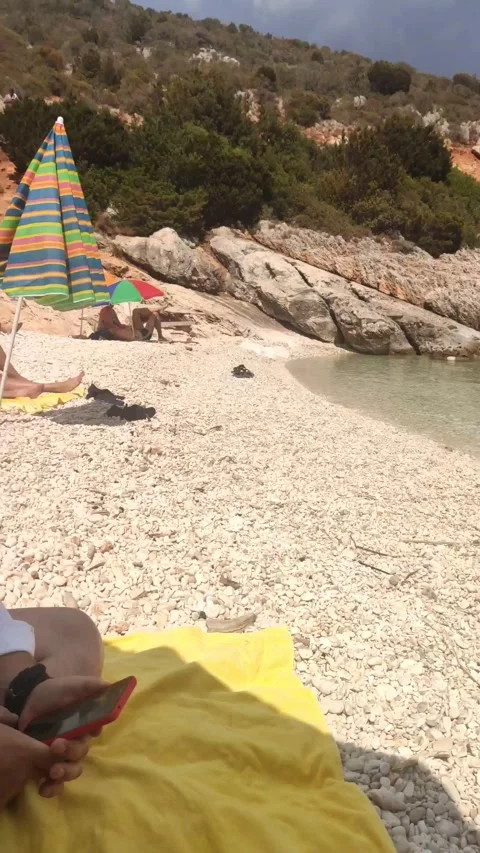 Talking man at the sea beach Stock Footage 166410045