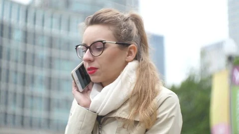 Talking on the mobile cell phone Stock Footage 81342146