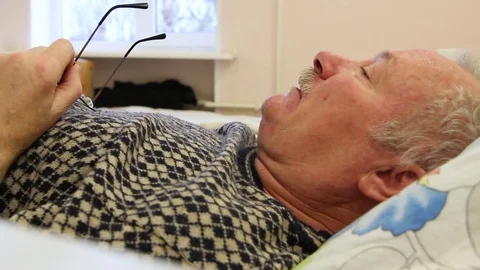 Talking old man rest in hosp Stock Footage 81836770