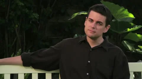 Talking on Phone Call While Sitting Outside Stock Footage 11237659