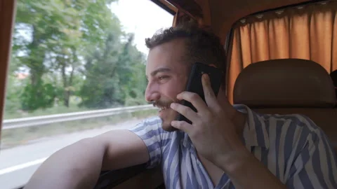 Talking on the phone in the car. Stock Footage 212407814