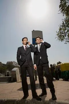 Talking on phone Stock Photos