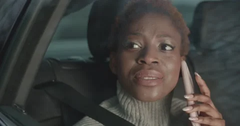 Talking on the phone smiling and laughing inside the car Stock Footage 186004177