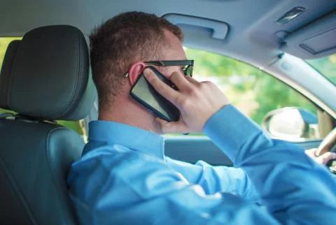 Talking by Phone While Driving. Stock Photos