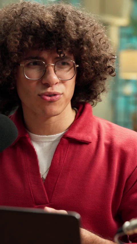 Talking, presenter or man with mic for podcast, answer audience questions or Stock Footage 335381653