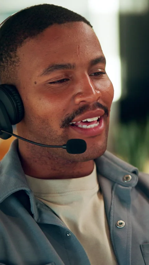 Talking, remote work and man with headset for customer support, contact us and Stock Footage 340781923