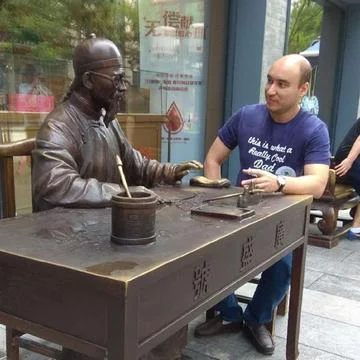 Talking with statue Stock Photos